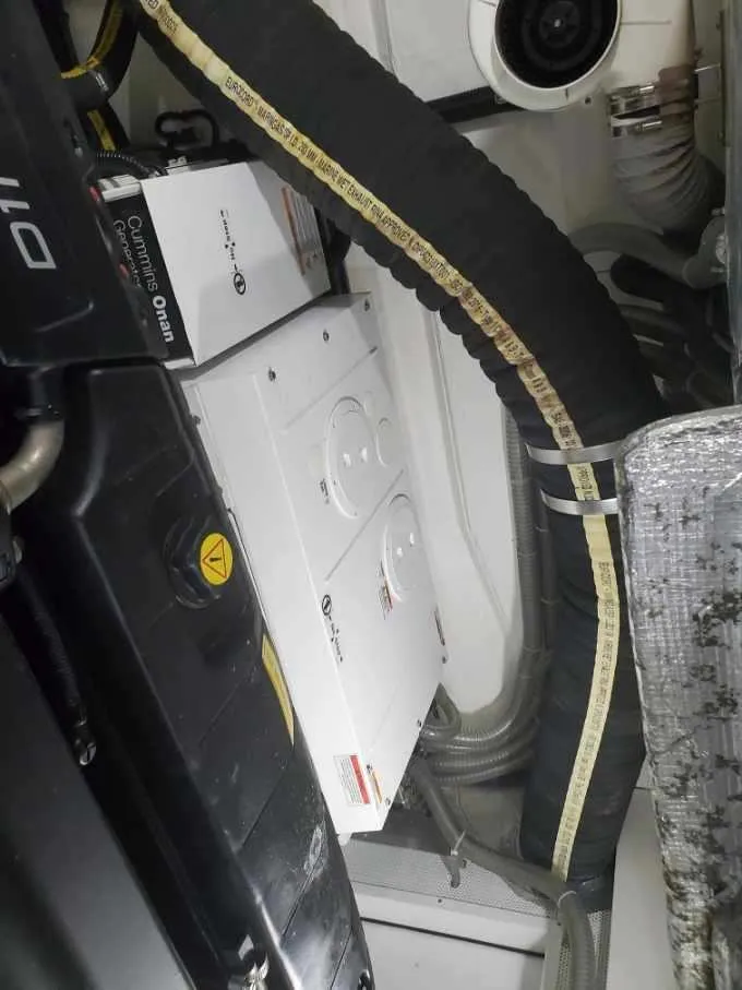 Slide: The Image of Engine room of a 2020 Galeon 500 Fly yacht with Cummins Onan generator. - 26