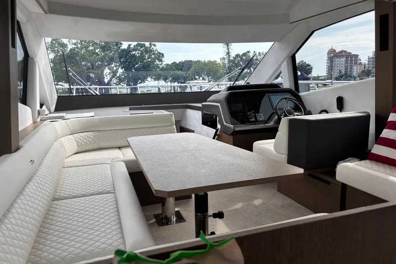 Slide: The Image of Interior of 2020 Galeon 500 Fly yacht with luxurious seating and helm. - 33