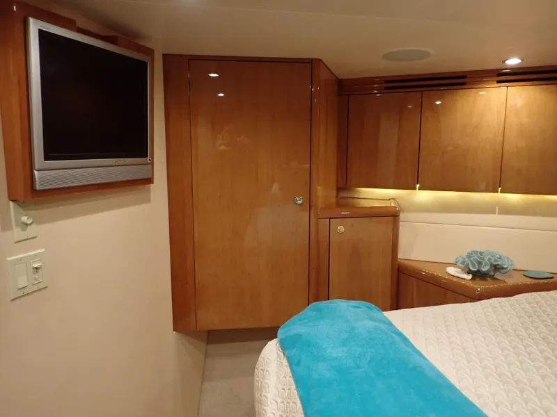 Slide: The Image of Hatteras 60 SOMETHING FISHY - Forward VIP Berth & TV - 13