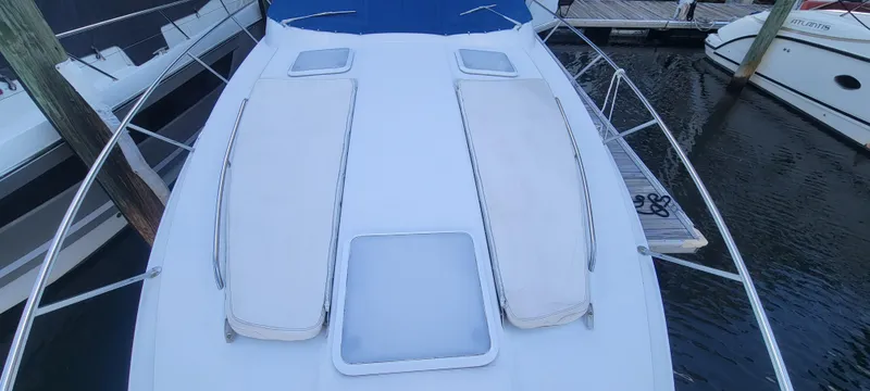 Slide: The Image of 2006 Formula 34 PC boat deck with sun pads and hatches. - 27