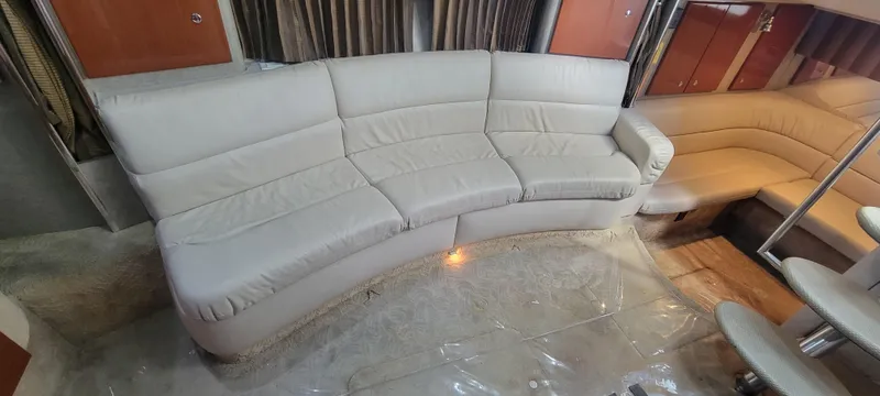 Slide: The Image of 2006 Formula 34 PC yacht interior with curved beige leather seating. - 33