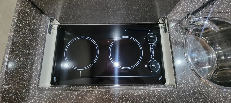 Slide: The Image of Built-in stovetop on 2006 Formula 34 PC yacht kitchen. - 43