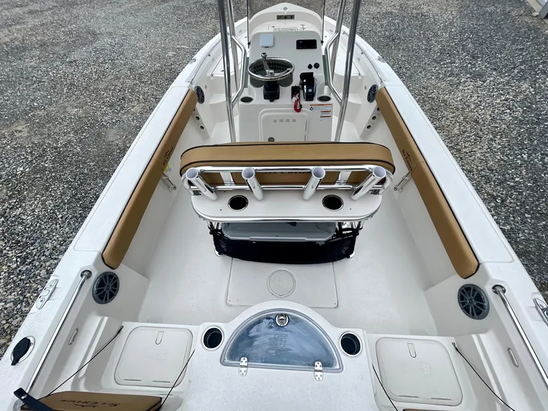 Slide: The Image of 2024 Sea Chaser 21 LX boat interior with seating and console. - 7