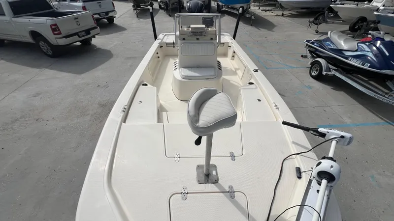 Slide: The Image of 2012 Frontier 2104 boat with seating and control console. - 11