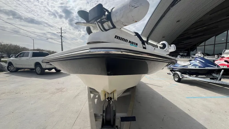 Slide: The Image of Front view of a 2012 Frontier 2104 boat with Minn Kota motor. - 5