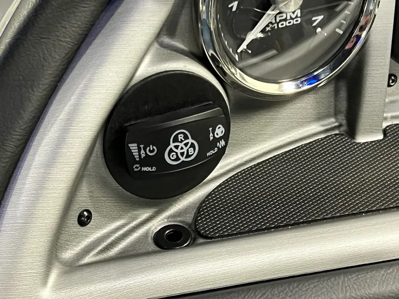 Slide: The Image of Control panel of 2024 Berkshire 25ULE Roswell Arch STS Tritoon with RPM gauge and RGB settings. - 16