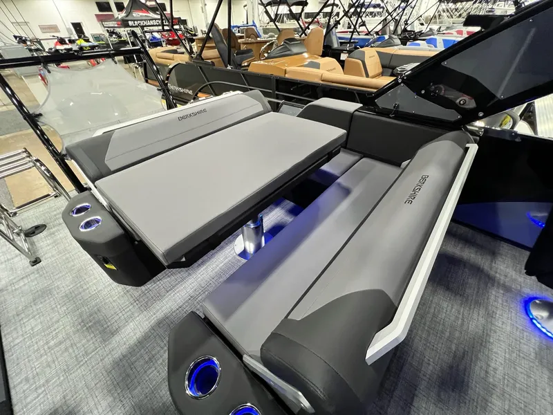 Slide: The Image of 2024 Berkshire 25ULE Roswell Arch STS Tritoon interior with sleek seating and cup holders. - 18