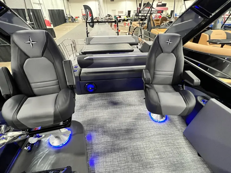 Slide: The Image of 2024 Berkshire 25ULE Roswell Arch STS Tritoon interior with luxury seating and modern design. - 19