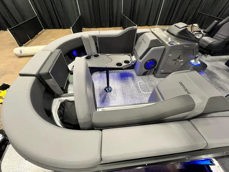 Slide: The Image of 2024 Berkshire 25ULE Roswell Arch STS Tritoon interior with gray seating and modern design. - 21