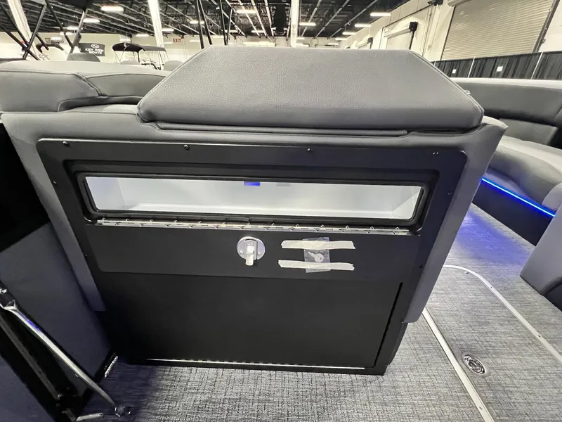 Slide: The Image of 2024 Berkshire 25ULE Roswell Arch STS Tritoon interior with storage compartment. - 24