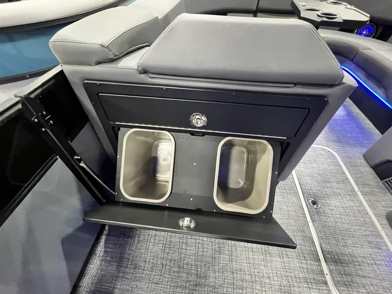 Slide: The Image of 2024 Berkshire 25ULE Roswell Arch STS Tritoon interior storage compartment with dual bins. - 28