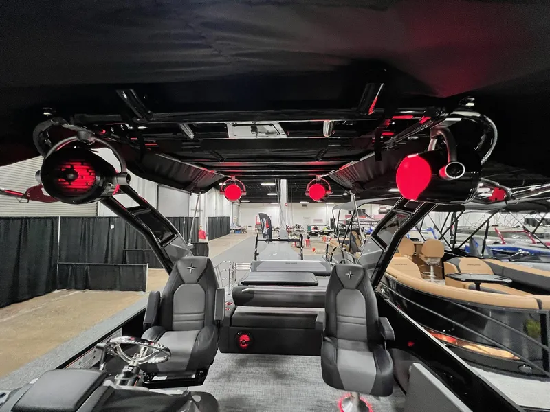 Slide: The Image of 2024 Berkshire 25ULE Roswell Arch STS Tritoon interior with red LED lighting. - 38