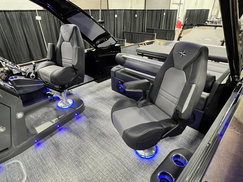 Slide: The Image of 2024 Berkshire 25ULE Roswell Arch STS Tritoon interior with luxury seating and blue LED lighting. - 41
