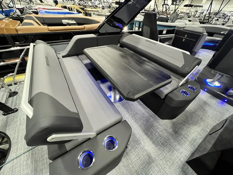 Slide: The Image of Interior seating and table of 2024 Berkshire 25ULE Roswell Arch STS Tritoon boat. - 42