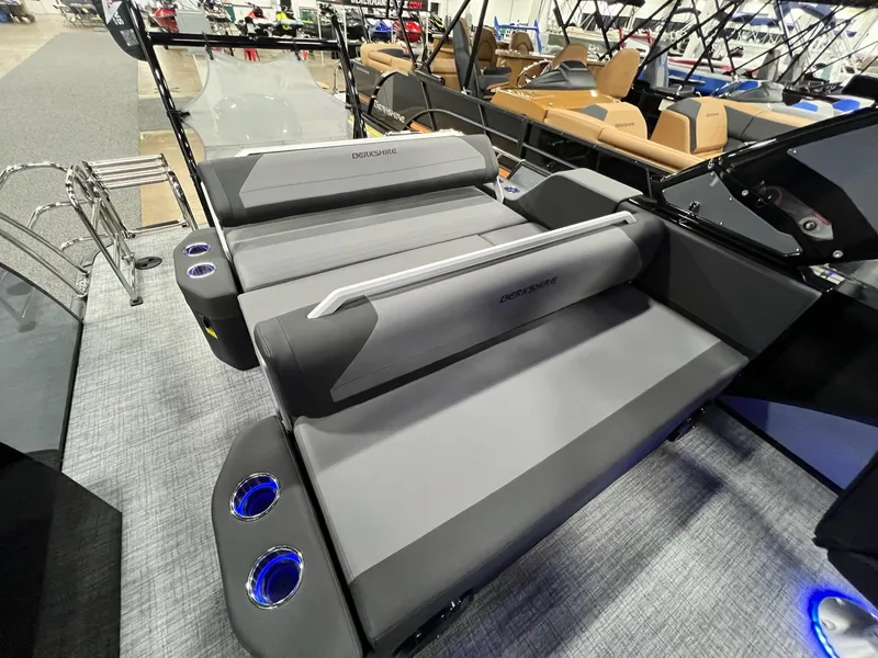 Slide: The Image of 2024 Berkshire 25ULE Roswell Arch STS Tritoon interior seating with cup holders. - 45