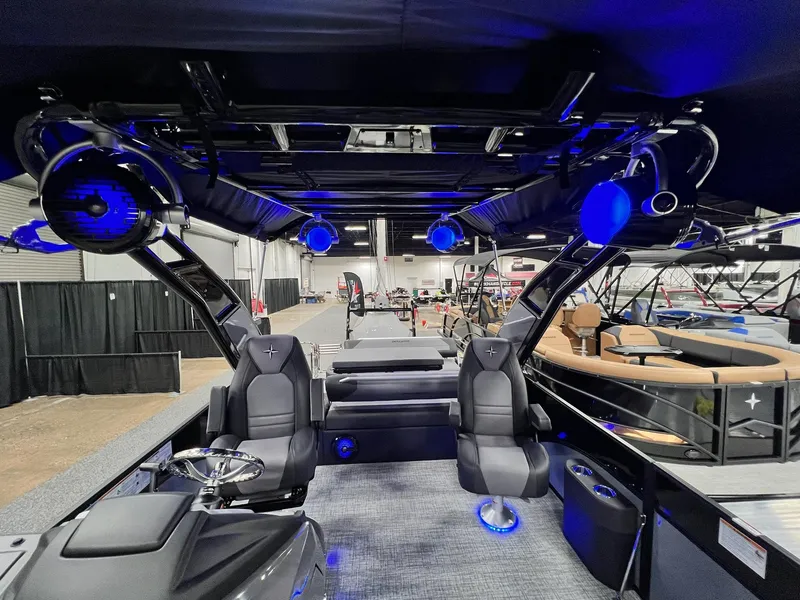 Slide: The Image of Interior of 2024 Berkshire 25ULE Roswell Arch STS Tritoon with blue LED lighting. - 47