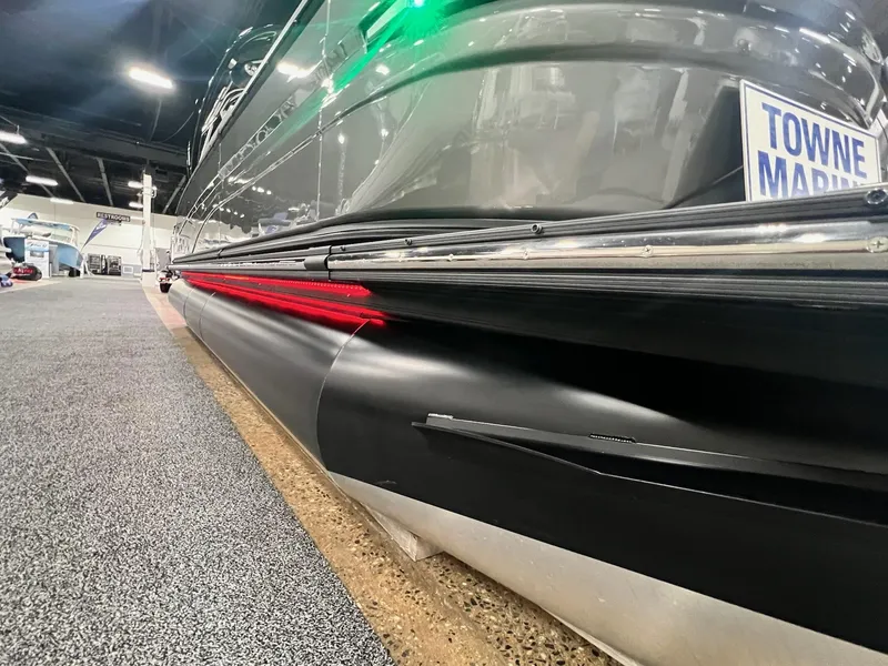 Slide: The Image of 2024 Sylvan G5 CLZ DC Arch Tritoon displayed at Towne Marine showroom. - 13