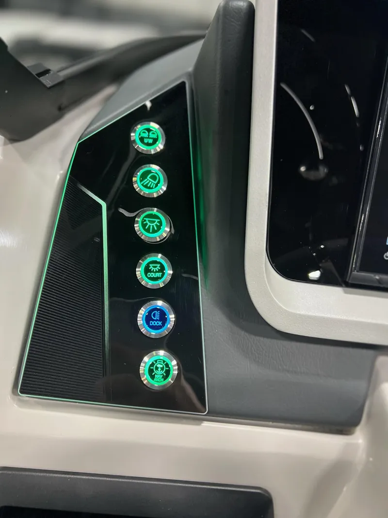Slide: The Image of Dashboard controls of 2024 Sylvan G5 CLZ DC Arch Tritoon boat. - 20