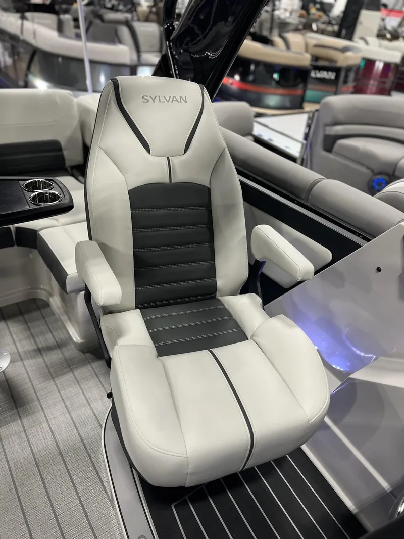 Slide: The Image of 2024 Sylvan G5 CLZ DC Arch Tritoon luxury boat seat with armrests and cup holders. - 22