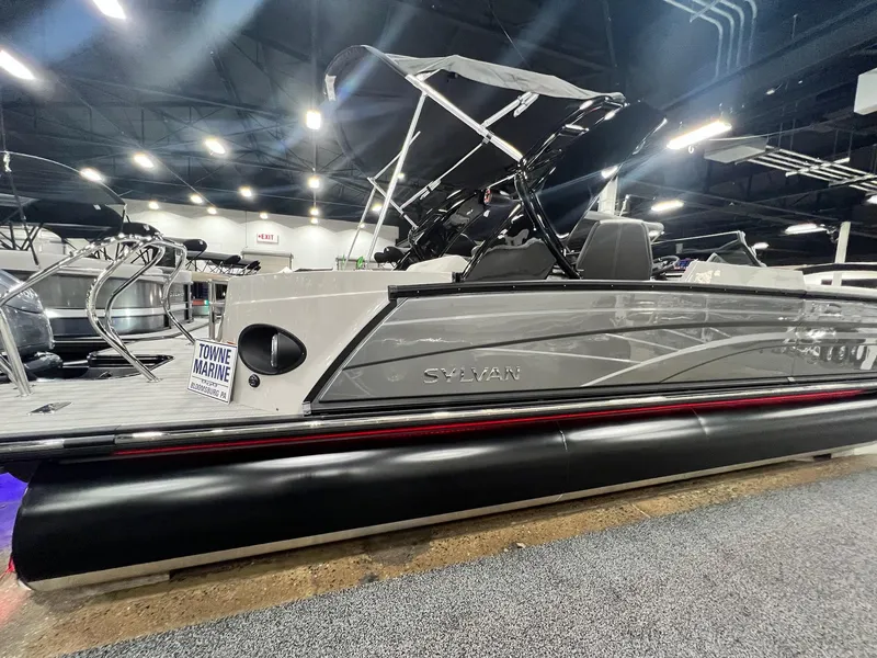 Slide: The Image of 2024 Sylvan G5 CLZ DC Arch Tritoon displayed indoors at Towne Marine. - 26