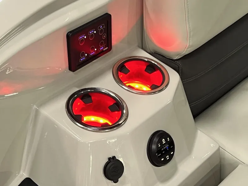Slide: The Image of Illuminated cup holders and control panel in 2024 Sylvan G5 CLZ DC Arch Tritoon. - 40