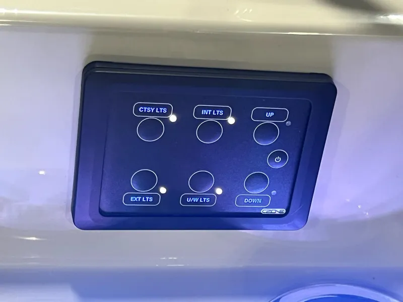 Slide: The Image of Control panel of 2024 Sylvan G5 CLZ DC Arch Tritoon boat with lighting options. - 41