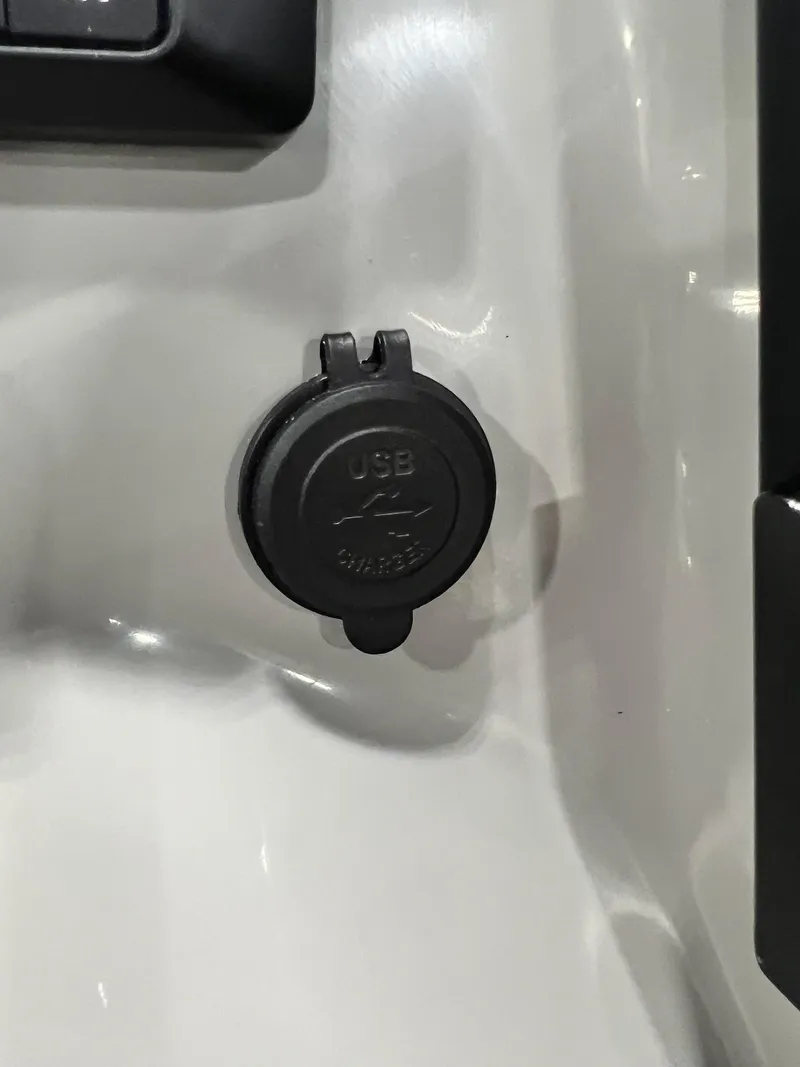 Slide: The Image of USB charging port on 2024 Sylvan G5 CLZ DC Arch Tritoon boat. - 45
