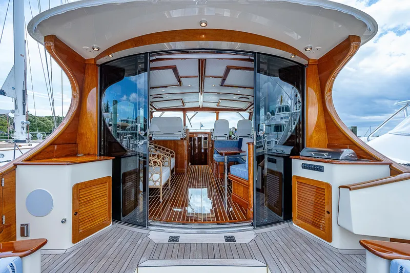 Slide: The Image of 2018 Hinckley Talaria 55 MKII MY yacht interior with elegant wood finish and modern design. - 18