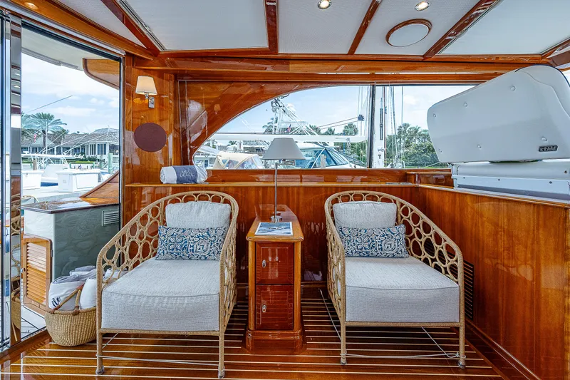 Slide: The Image of Luxurious 2018 Hinckley Talaria 55 MKII MY yacht interior with elegant seating and wood finish. - 23