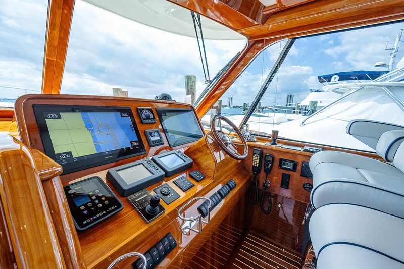 Slide: The Image of 2018 Hinckley Talaria 55 MKII MY yacht cockpit with navigation equipment and luxurious seating. - 27