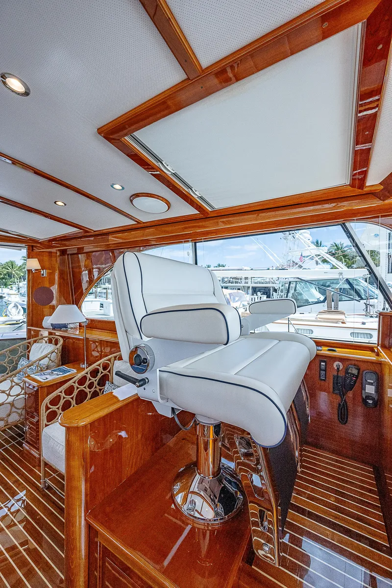 Slide: The Image of Luxurious interior of 2018 Hinckley Talaria 55 MKII MY yacht with elegant captain's chair. - 32