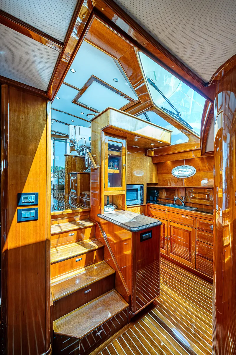 Slide: The Image of Luxurious interior of 2018 Hinckley Talaria 55 MKII MY yacht with polished wood finish. - 34