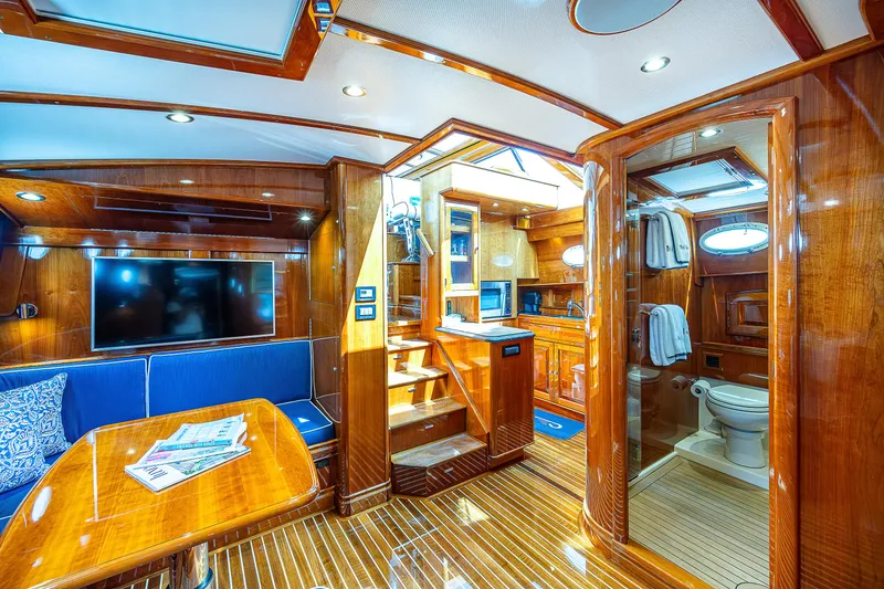 Slide: The Image of Luxurious interior of 2018 Hinckley Talaria 55 MKII MY yacht with wood finishes and modern amenities. - 43