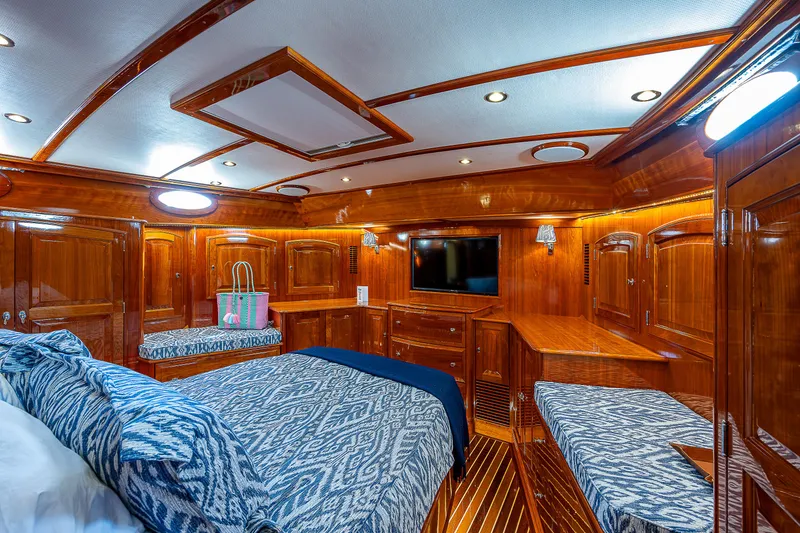 Slide: The Image of Luxurious 2018 Hinckley Talaria 55 MKII MY yacht cabin with elegant wood finish and modern amenities. - 46