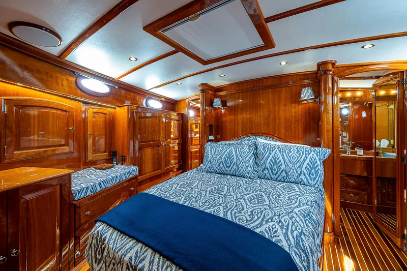 Slide: The Image of Luxurious wooden interior of 2018 Hinckley Talaria 55 MKII MY yacht bedroom. - 48