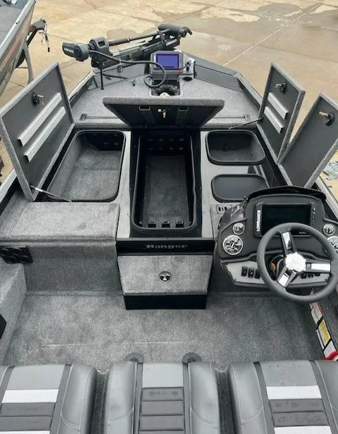 Slide: The Image of 2024 Ranger RT188P fishing boat interior with storage compartments and control console. - 4