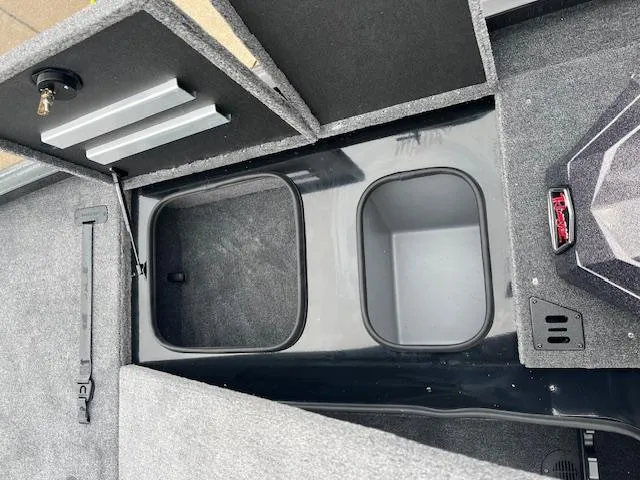 Slide: The Image of 2024 Ranger RT188P boat storage compartments and interior details. - 7