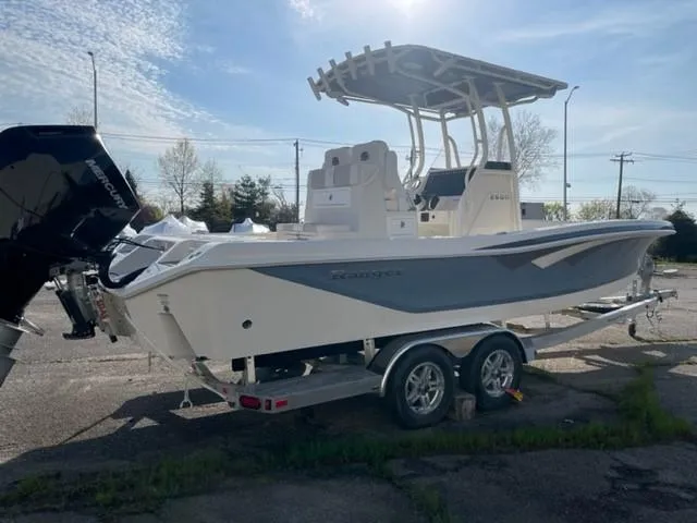 Slide: The Image of 2024 Ranger 2600 Bay boat on a trailer, side view. - 0