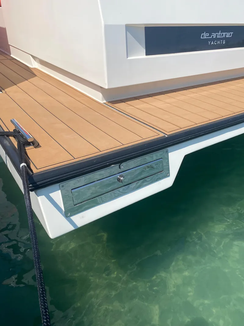 Slide: The Image of De Antonio Yachts D 28 2020 model, rear deck view with teak flooring. - 22