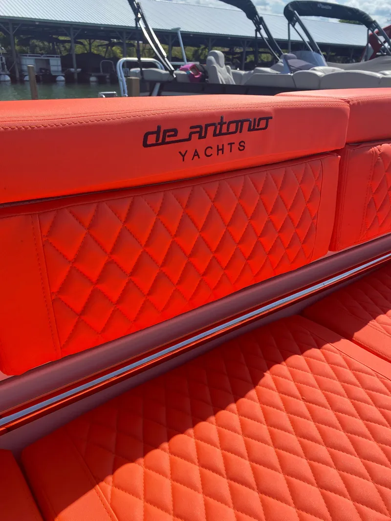 Slide: The Image of De Antonio Yachts D 28 2020 model with luxurious orange quilted seating. - 44