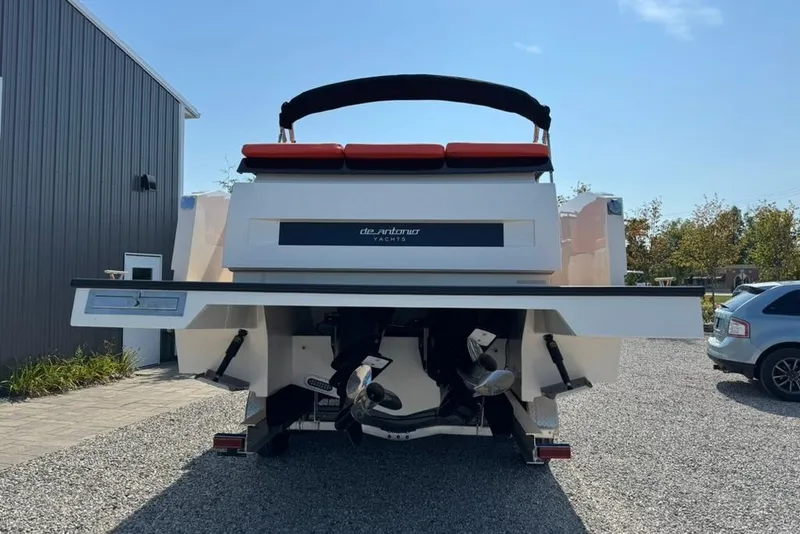 Slide: The Image of Rear view of 2020 De Antonio Yachts D28, parked on gravel. - 58