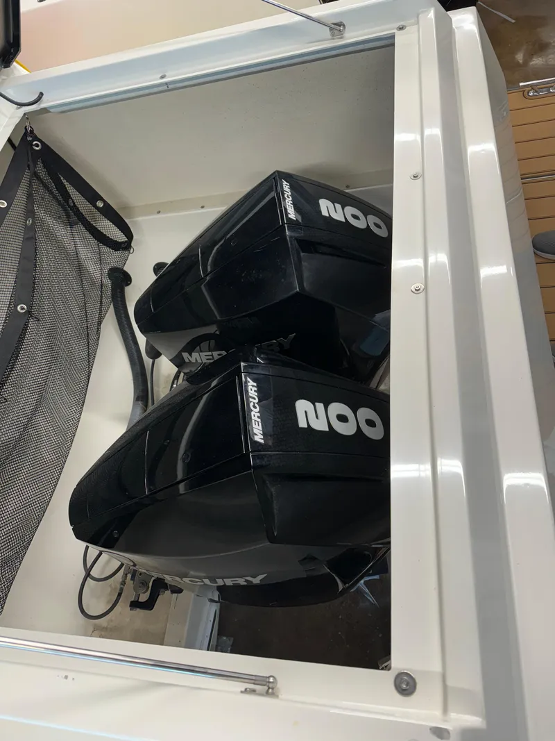 Slide: The Image of Twin Mercury outboard engines on a 2020 De Antonio Yachts D 28. - 6