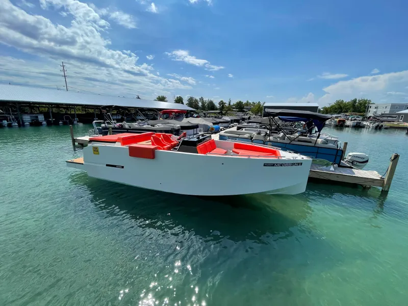 Slide: The Image of 2020 De Antonio Yachts D 28 docked in clear water on a sunny day. - 9