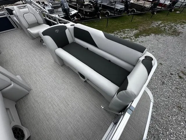 Slide: The Image of 2024 Tahoe Pontoon SPORT 2180 QL interior seating area with gray and black upholstery. - 5