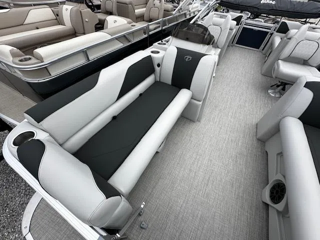 Slide: The Image of 2024 Tahoe Pontoon SPORT 2180 QL interior with luxurious seating and modern design. - 6