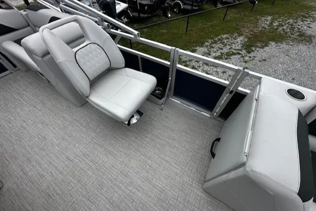 Slide: The Image of 2024 Tahoe Pontoon SPORT 2180 QL interior with plush seating and modern design. - 9