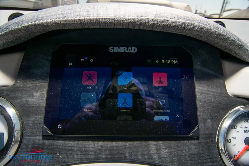 Slide: The Image of 2023 Crest Caribbean LX 250 SLC dashboard with Simrad display. - 14