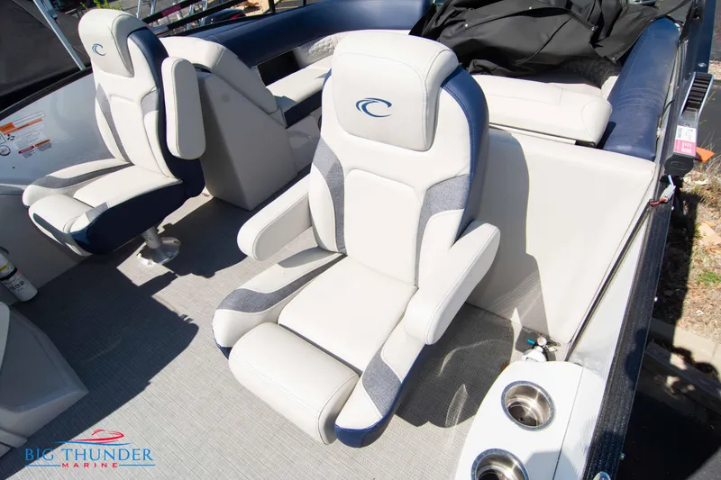 Slide: The Image of 2023 Crest Caribbean LX 250 SLC boat interior with luxurious seating. - 26