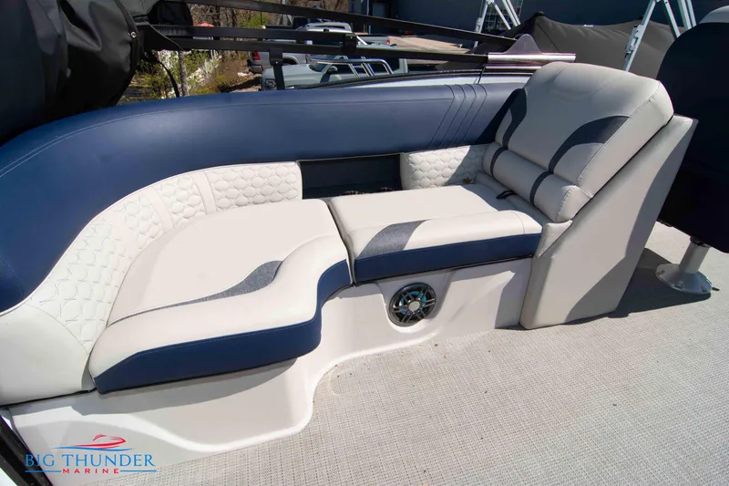 Slide: The Image of 2023 Crest Caribbean LX 250 SLC boat interior with luxurious seating. - 28