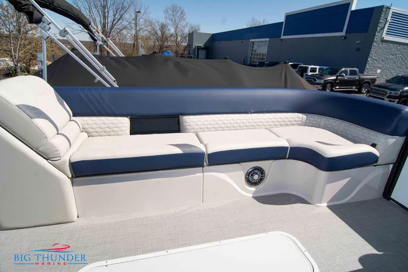 Slide: The Image of 2023 Crest Caribbean LX 250 SLC boat interior with luxurious seating. - 6